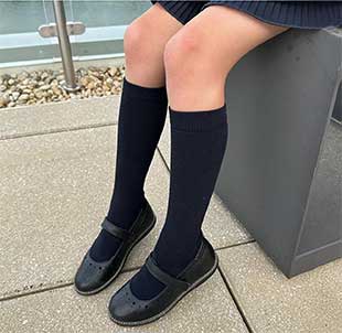 Knee high socks for kids who wear Mary Jane shoes.