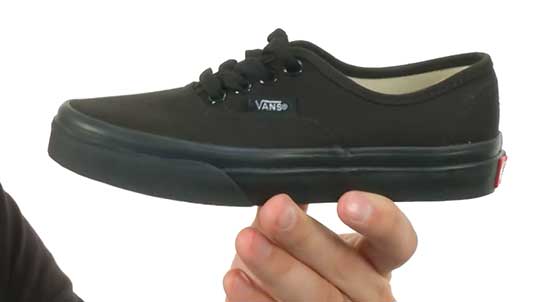 Classic all black Vans shoes for kids.