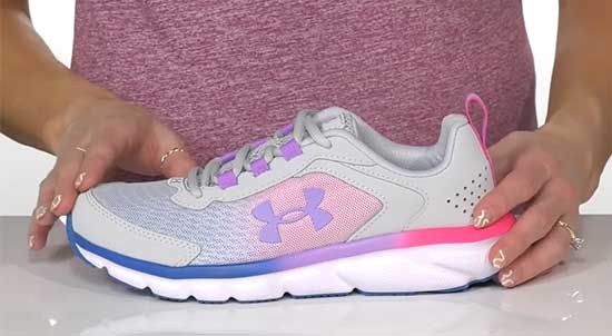 Multicolor Under Armour shoe for girls with narrow feet.