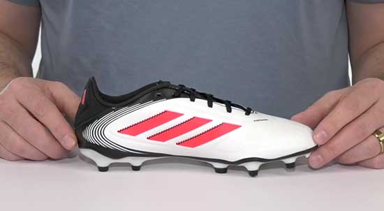 Narrow Adidas soccer cleats for kids.