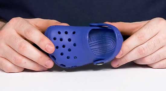 Navy blue Crocs for kids.