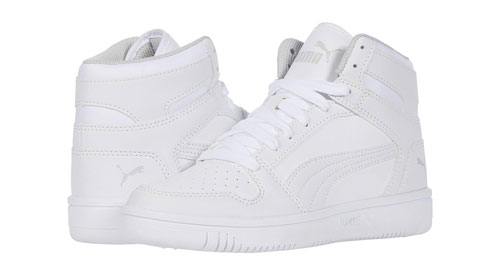 White high top Puma kids' shoe that is rigid at the front to help prevent toe walking.