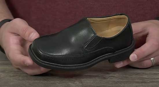 Black slip on dress shoes for kids with wide feet.