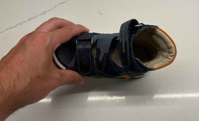 Orthopedic sandal for kids that fit orthotics.