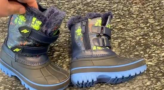 Kids' snow boots with double velcro straps and a side zipper.