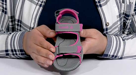 Pink sandal with three adjustable straps for kids who wear AFOs or SMOs.