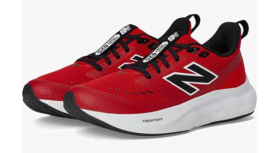 Red New Balance running shoe for boys.