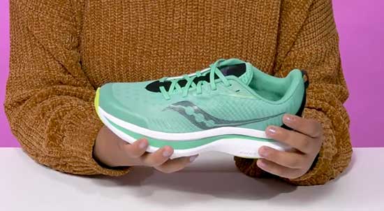 Saucony teal running shoes for girls.