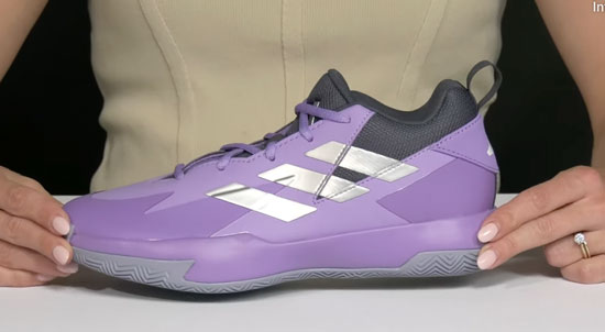 Adidas kids basketball shoe with wide toe-boxes in purple for girls.