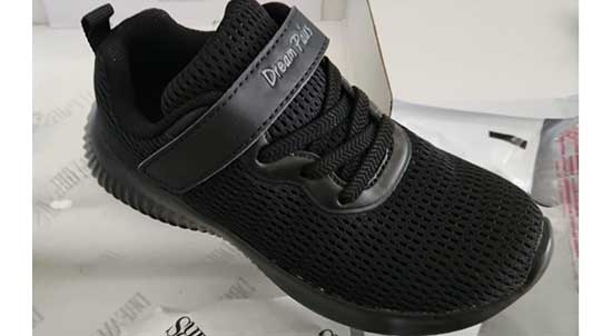 Breathable black sneakers for kids.