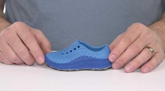 Navy blue Natives shoes for boys.