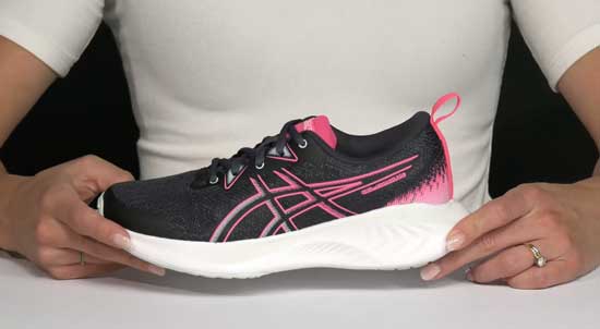 Supportive Asics Cumulus running shoe for girls.