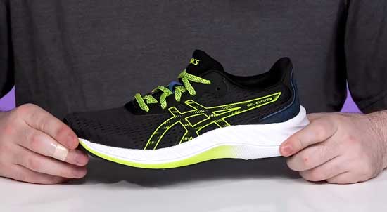 Supportive Asics Gel-Excite running shoe for boys.