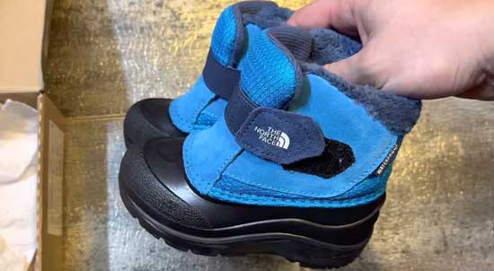 Waterproof and insulated North Face boot for toddlers.