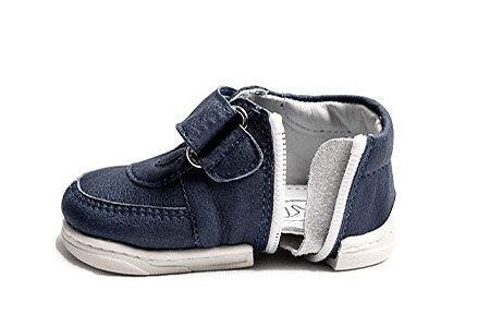 Toddler shoes with side zippers that are easy to get on and off.
