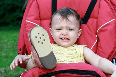 Find out the reason why your toddler keeps taking his or her shoes off.