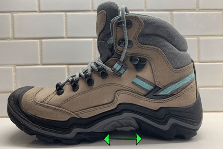 A pair of kids' hiking boots with arch support.