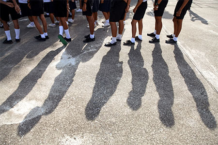 Children in school wearing supportive and durable shoes.