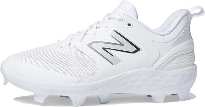 White New Balance baseball cleat for kids in men's shoe sizes.