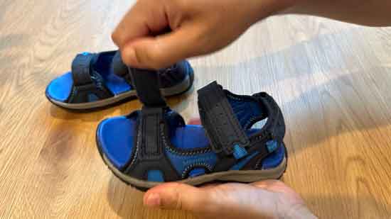 Kids' sandals with adjustable velcro straps.