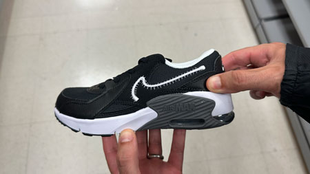 Back to school Nike shoe with a firm heel counter.