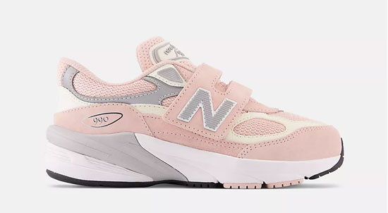 New Balance 990 kids' shoe with velcro in pink.