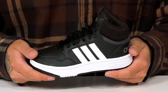 Supportive Adidas high-top shoe for kids.