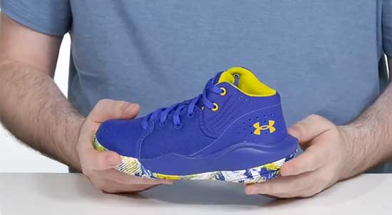 Royal Blue Under Armour basketball shoes for kids.