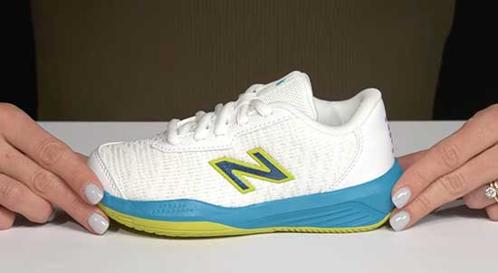 Wide New Balance tennis shoes for kids.