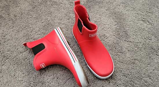 Short red rain boots for kids with wide feet.