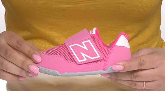 Pink New Balance shoes for baby girls.