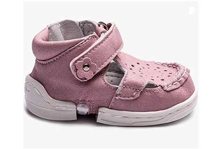 Pink easy on and off shoes for babies.