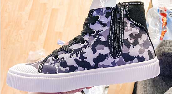 Kids' shoes with side zippers.