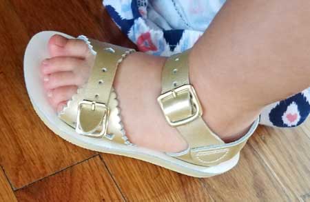 Gold salt water sandals for girls.