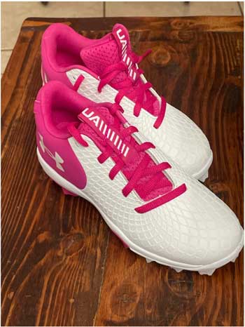 Pink softball cleats for girls.