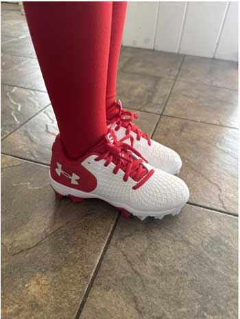 Red softball cleats for kids.