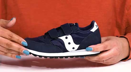 Saucony shoes with double Velcro straps.