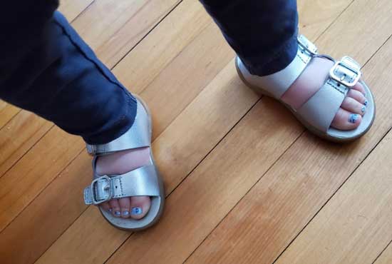 Silver Merrell sandals for girls.