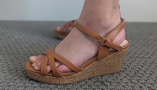 Brown wedge sandals for girls.
