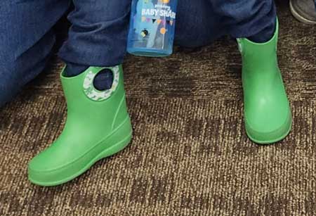 Green rain boots for toddlers.
