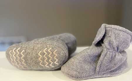 Newborn booties in grey.