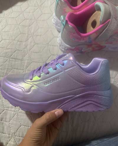 Purple metallic girl's Skechers with memory foam.