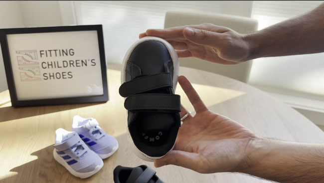 Adidas toddler shoes with rounded toe-boxes.