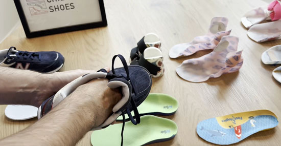Checking if the orthotics fit.