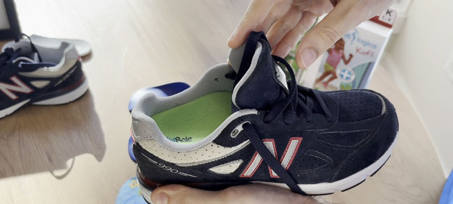 Example of a child's orthotic that doesn't fit correctly inside shoes.