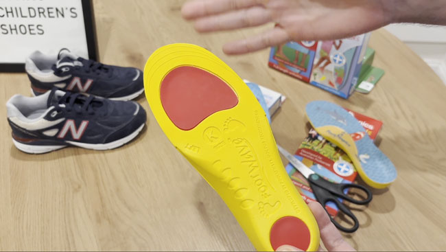 Guiding lines on the back of an orthotic to trim it correctly.