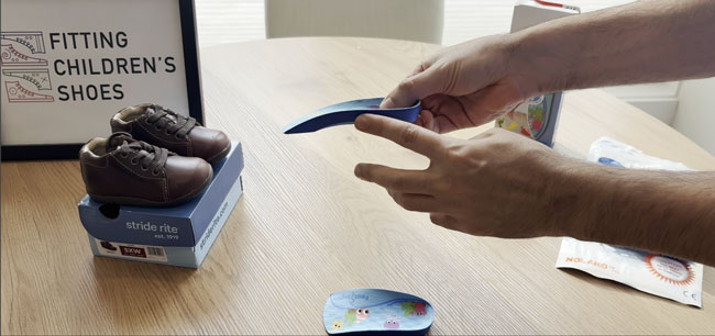 Footlogic 3/4-length orthotic with soft arch support.