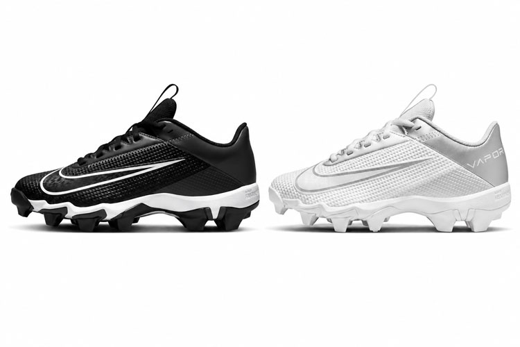 Nike kids' football cleats for wide feet displayed side by side on a white background.