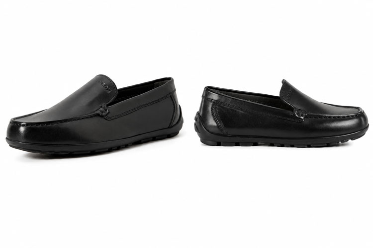 Black kids slip-on school loafers shown from front and side views on a white background.