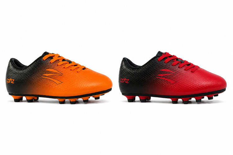 Extra wide kids soccer cleats available in orange and red color options for children with extra wide feet.